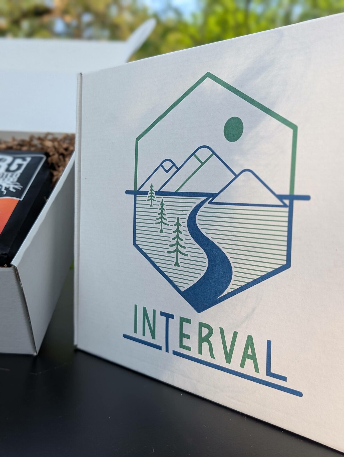 Close-up of the Interval logo printed on the gift box